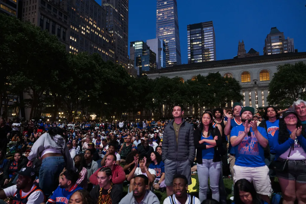 People react during a watch party in Bryant Park for Game 3 of the NBA Finals between New York Knicks and San Antonio Spurs on June 8, 2026 in New York City.