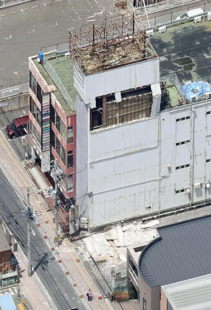 A wall collapsed from the side of a building after an earthquake in Hachinohe, Japan, on June 25, 2026.