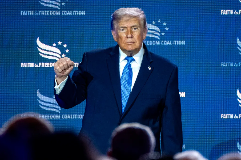 Donald Trump giving a speech at the Faith and Freedom Coalition's 2026 Road to Majority Policy Conference.