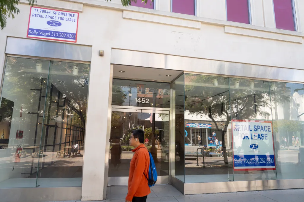 Street-level view of a commercial building in Santa Monica with multiple 