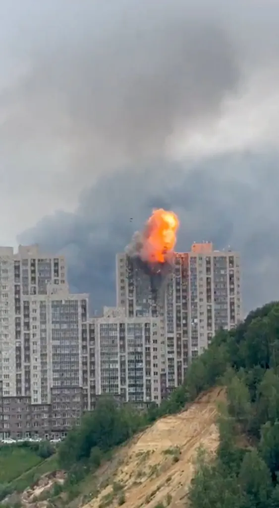 Fire and smoke rise from a building following a Ukrainian drone attack in Moscow, Russia, June 18, 2026