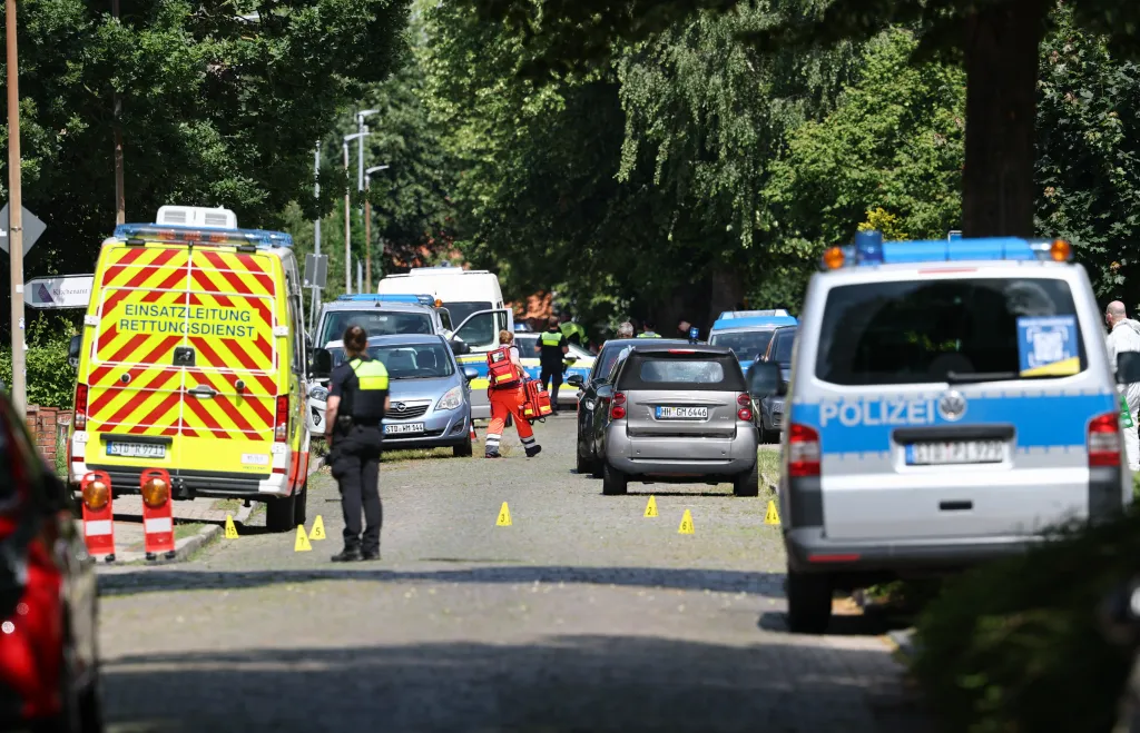 Police and rescuers at the scene of a shooting in Stade, Germany.