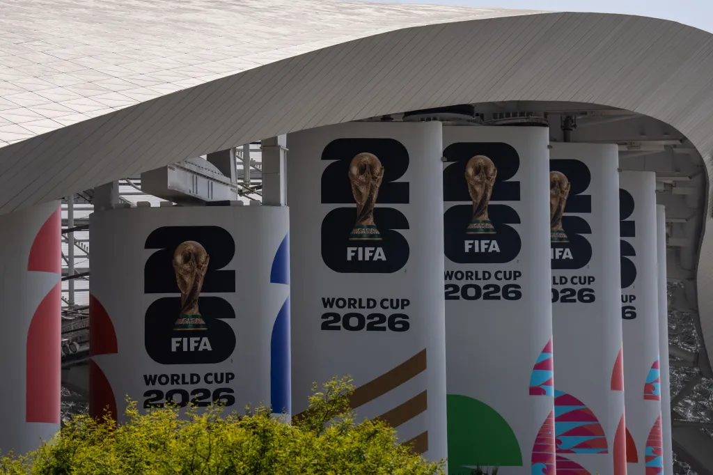 FIFA World Cup 2026 signage featuring the trophy at SoFi Stadium in Inglewood, California.