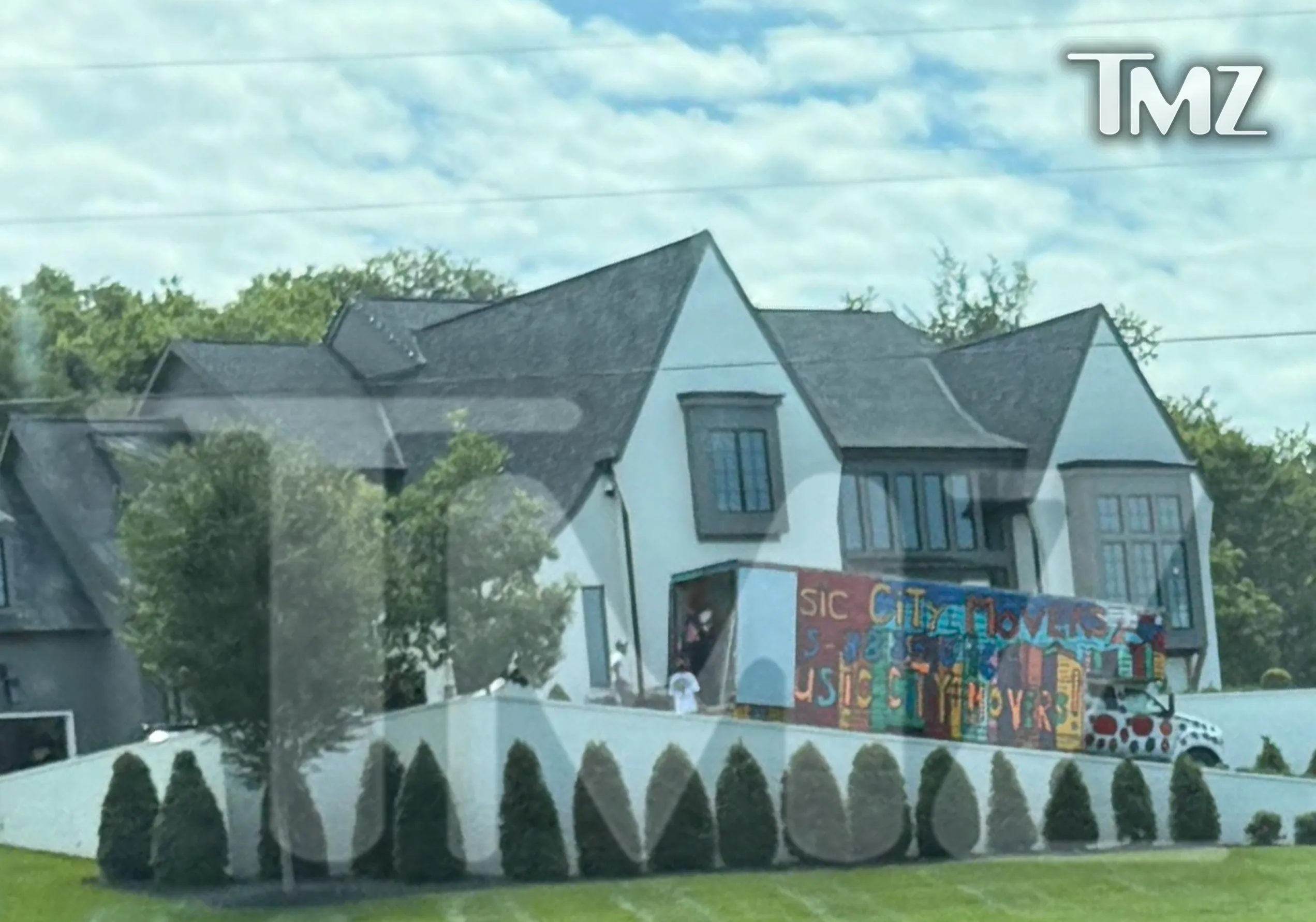 Movers at Jelly Roll's house.