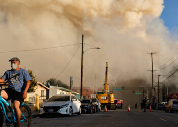 Warehouse Fire in L.A. Still Burns, Spreading Smoke Across Region