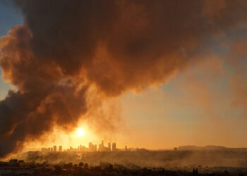 Dark Smoke in a Sunny Place: Neighbors of L.A. Fire Struggle for Breath