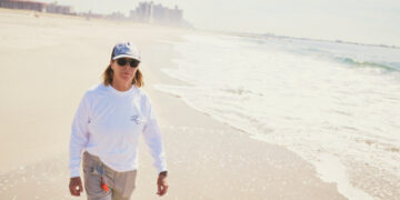 After 40 Years, a Tenacious Lifeguard Still Swims Against the Tide