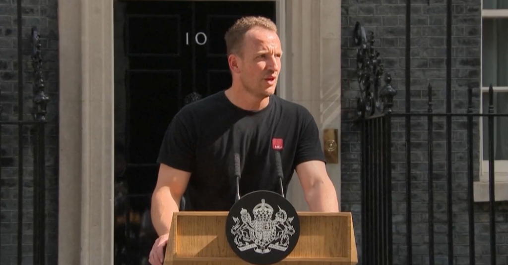 He Is British, Mysterious and Has Outlasted 5 Prime Ministers: Meet ‘Hot Podium Guy.’