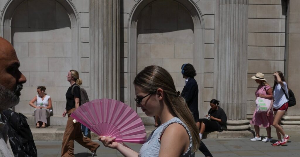 Windows Are Open and Shoes Are Off, but Class Is Still On in Extreme Heat