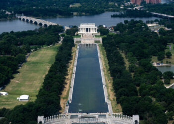 Visitors Look at the Reflecting Pool and Disagree on What They See