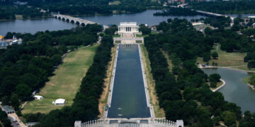 Visitors Look at the Reflecting Pool and Disagree on What They See