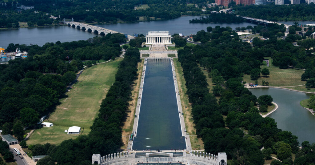 Visitors Look at the Reflecting Pool and Disagree on What They See