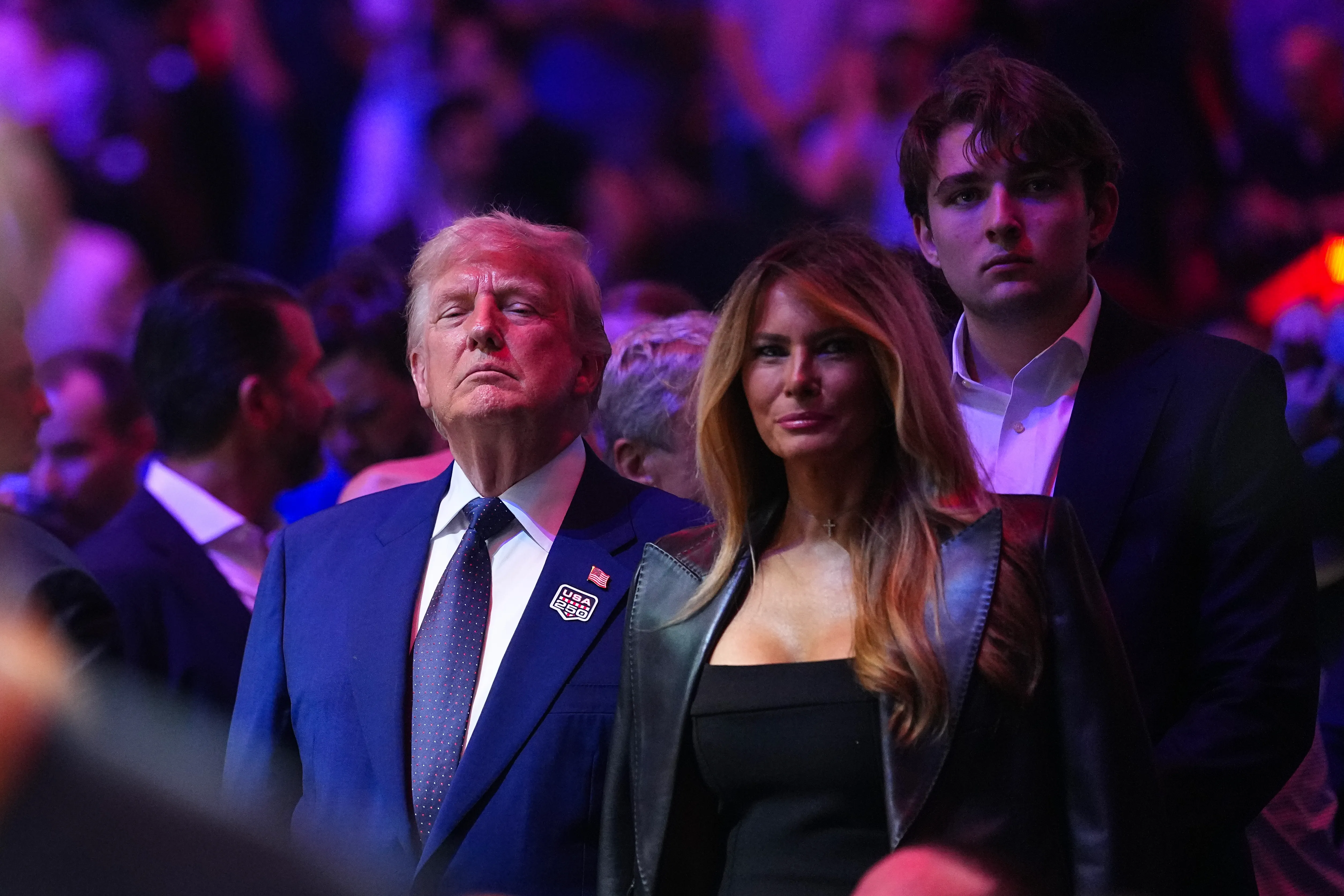 Donald Trump, Melania Trump, and Barron Trump attending the UFC Freedom 250 event.