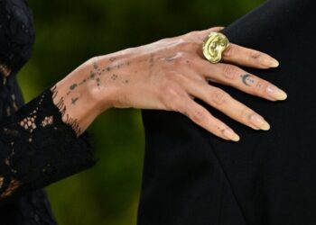 When Did Bare Nails Become a Status Symbol?