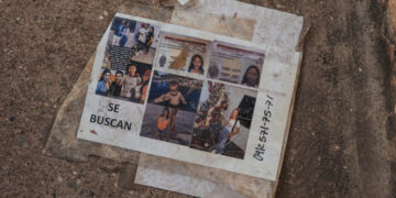 At a Caracas Morgue, Families and Officials Try to Identify More Than 100 Victims