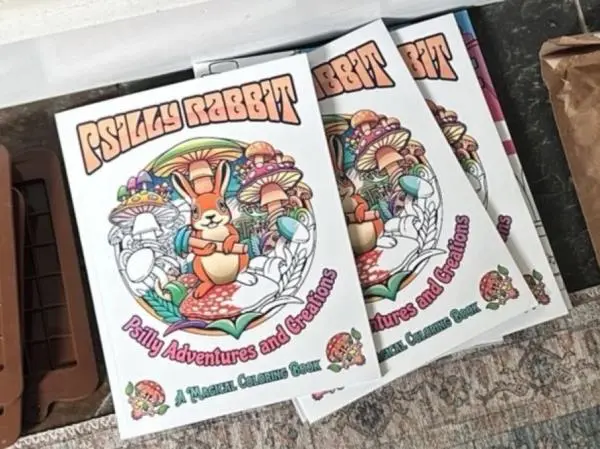 Three coloring books titled 