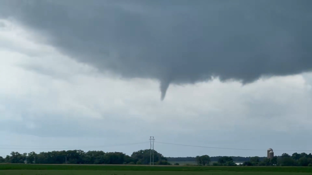 Footage captured by Trevor Oliver at 3:46 pm shows a funnel cloud which developed in Warsaw, south of Hamilton, where the National Weather Service (NWS) issued a Tornado Warning.