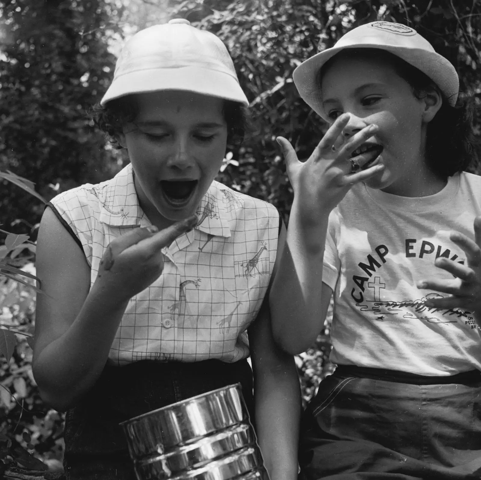 girls church camp eating jam