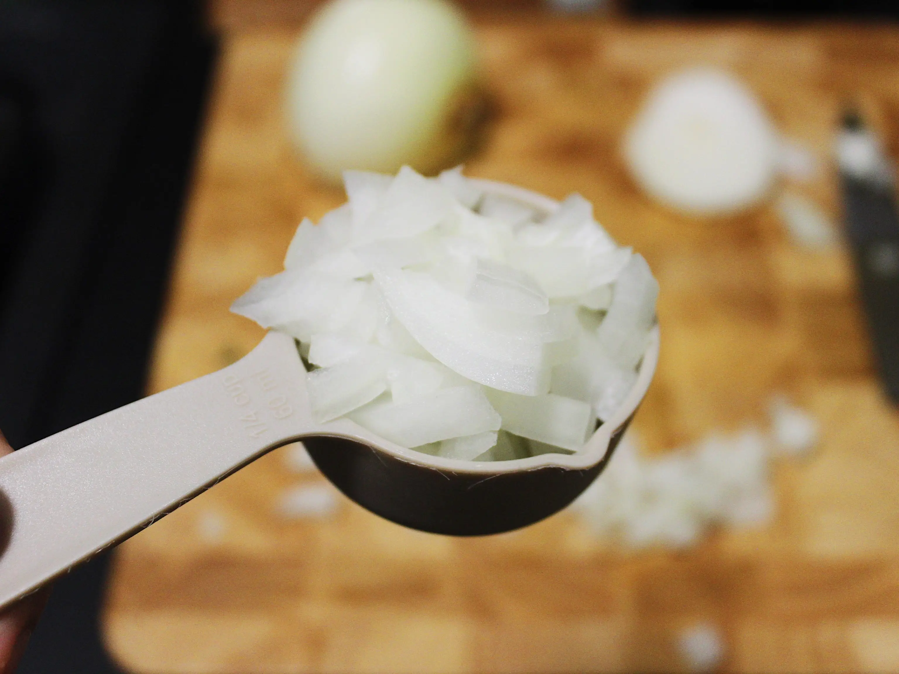 a quarter cup of chopped yellow onion