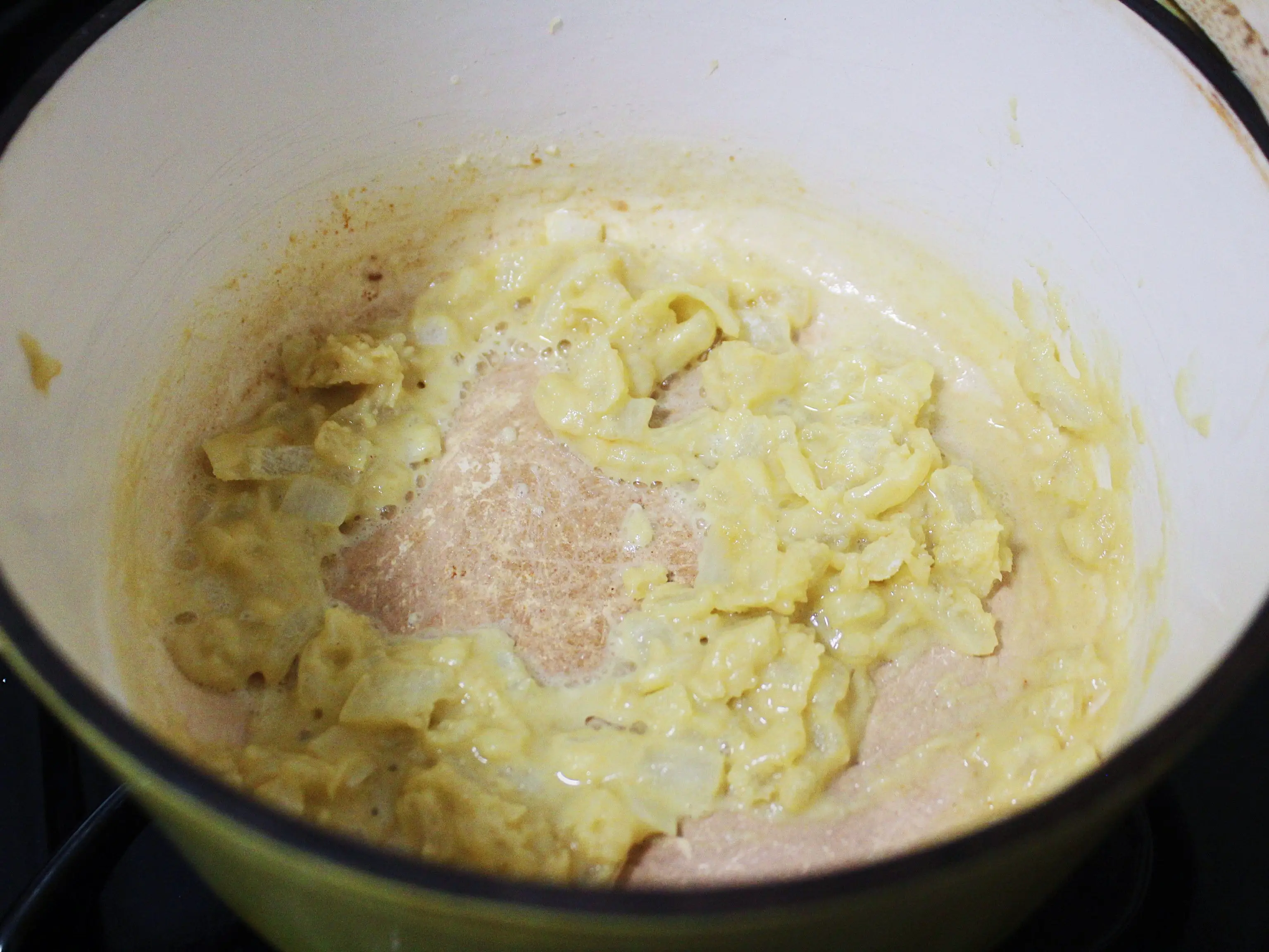 onions and butter mixed with flour on the stove