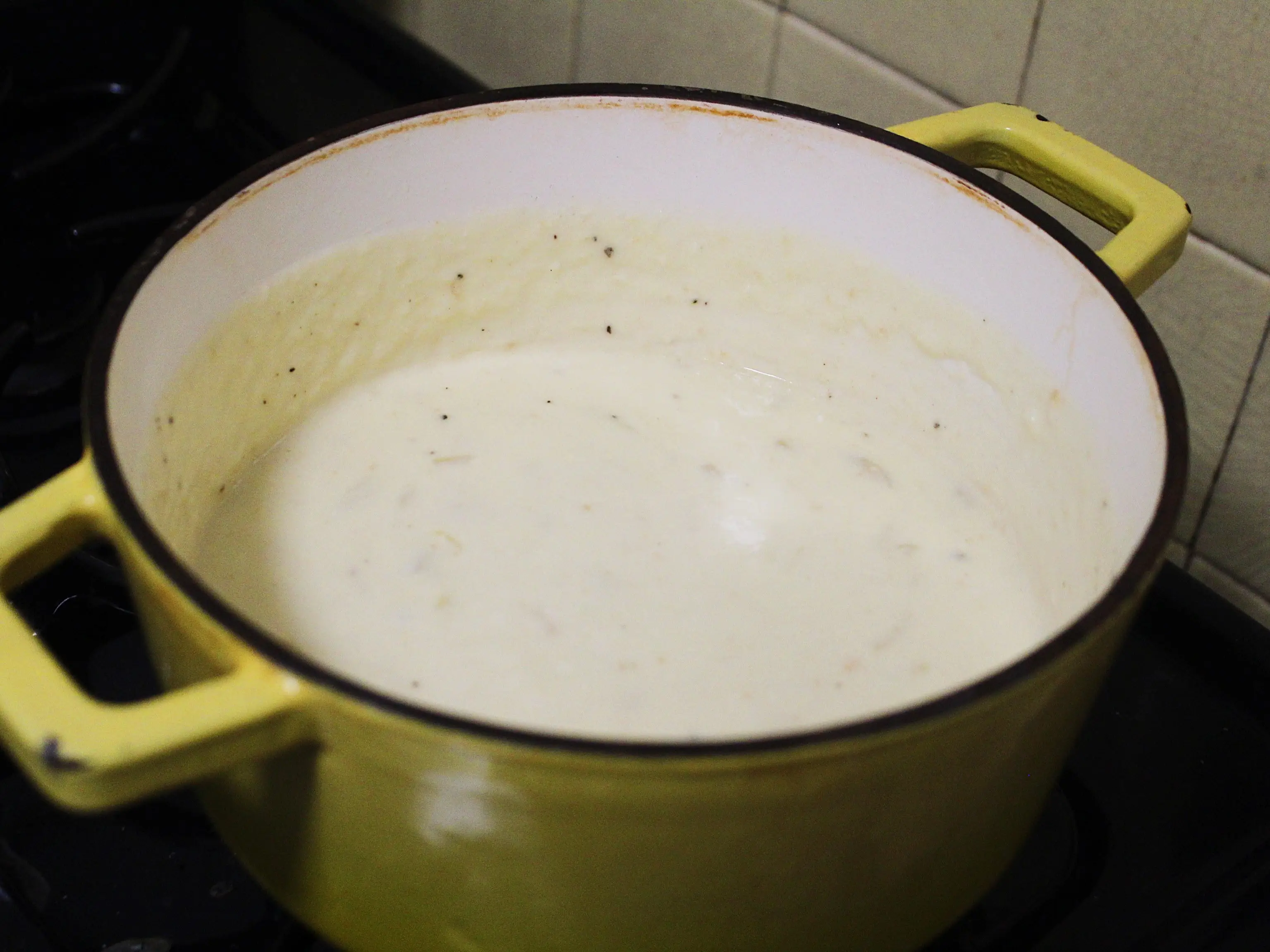 cheese sauce in a pot on the stove