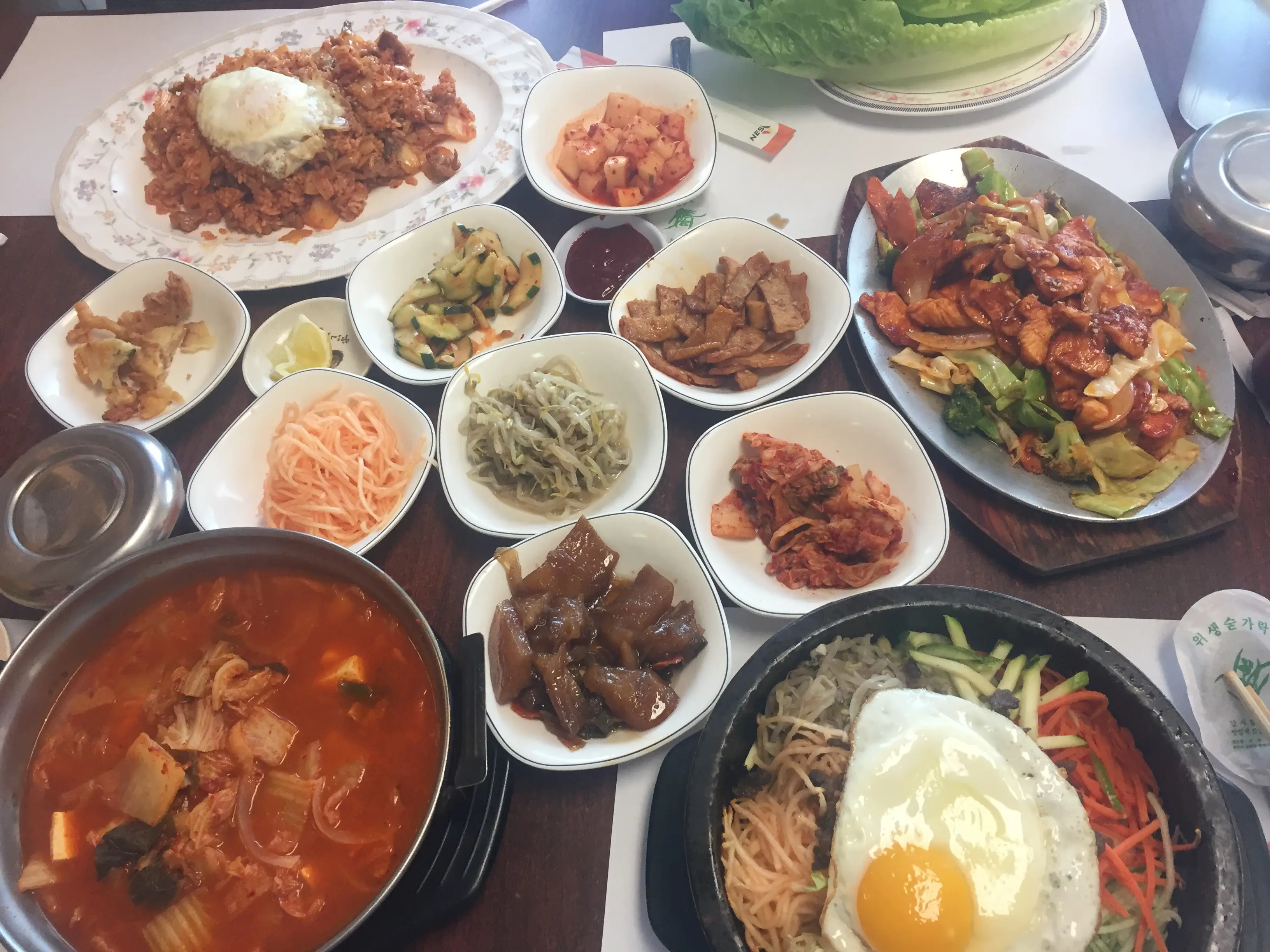 a table filled with plates of food in korea house