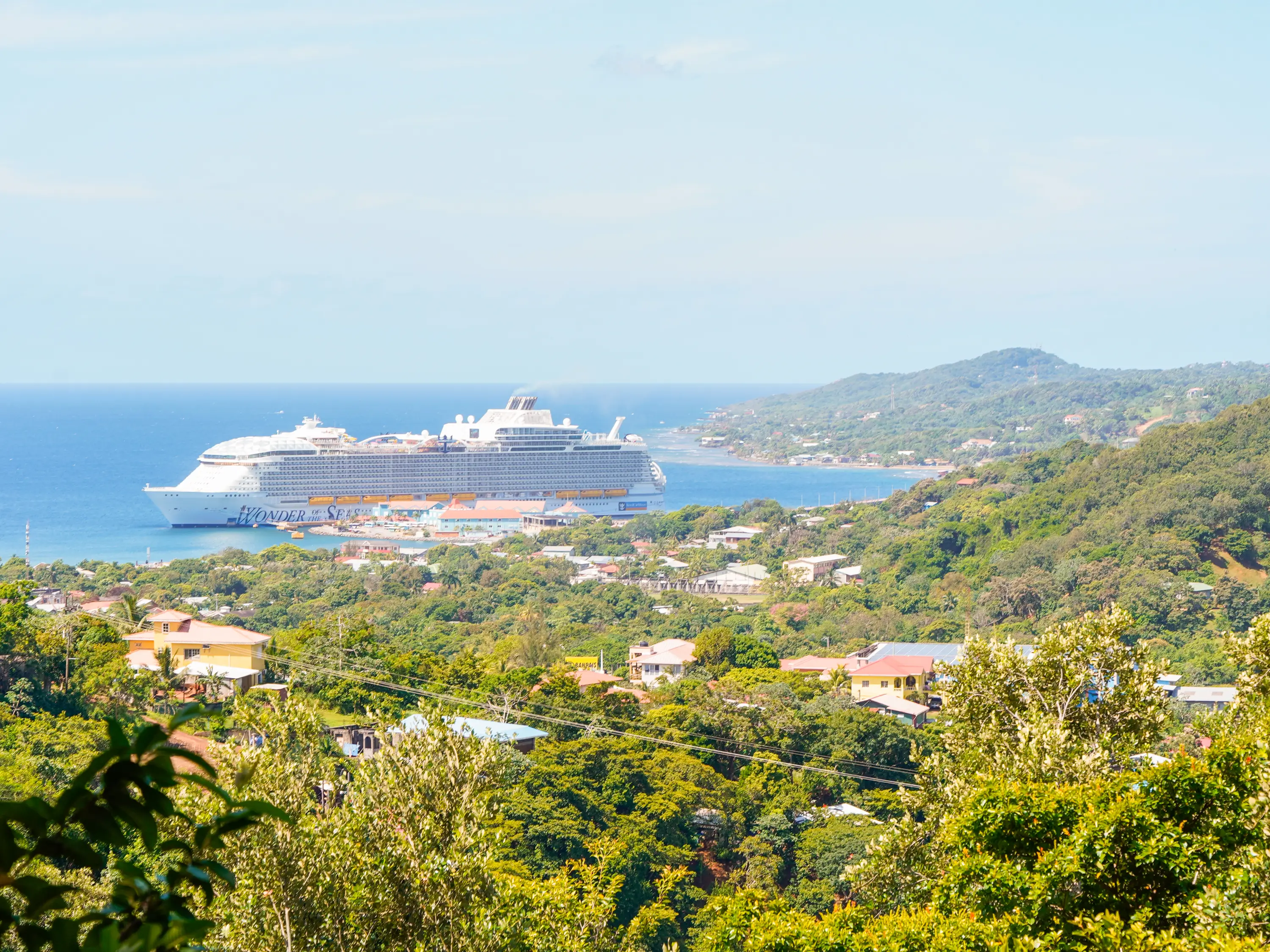 The largest cruise ship in the world, wonder of the seas, is seen docked in Roatan Honduras