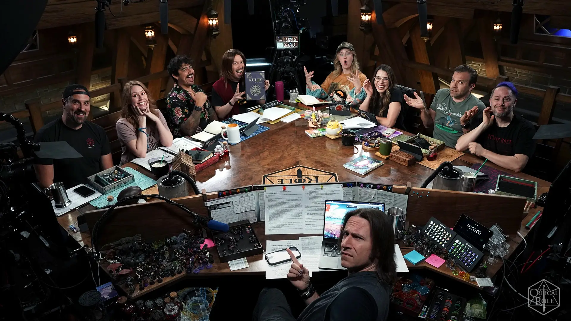 A top-shot of the Critical Role cast in their studio.
