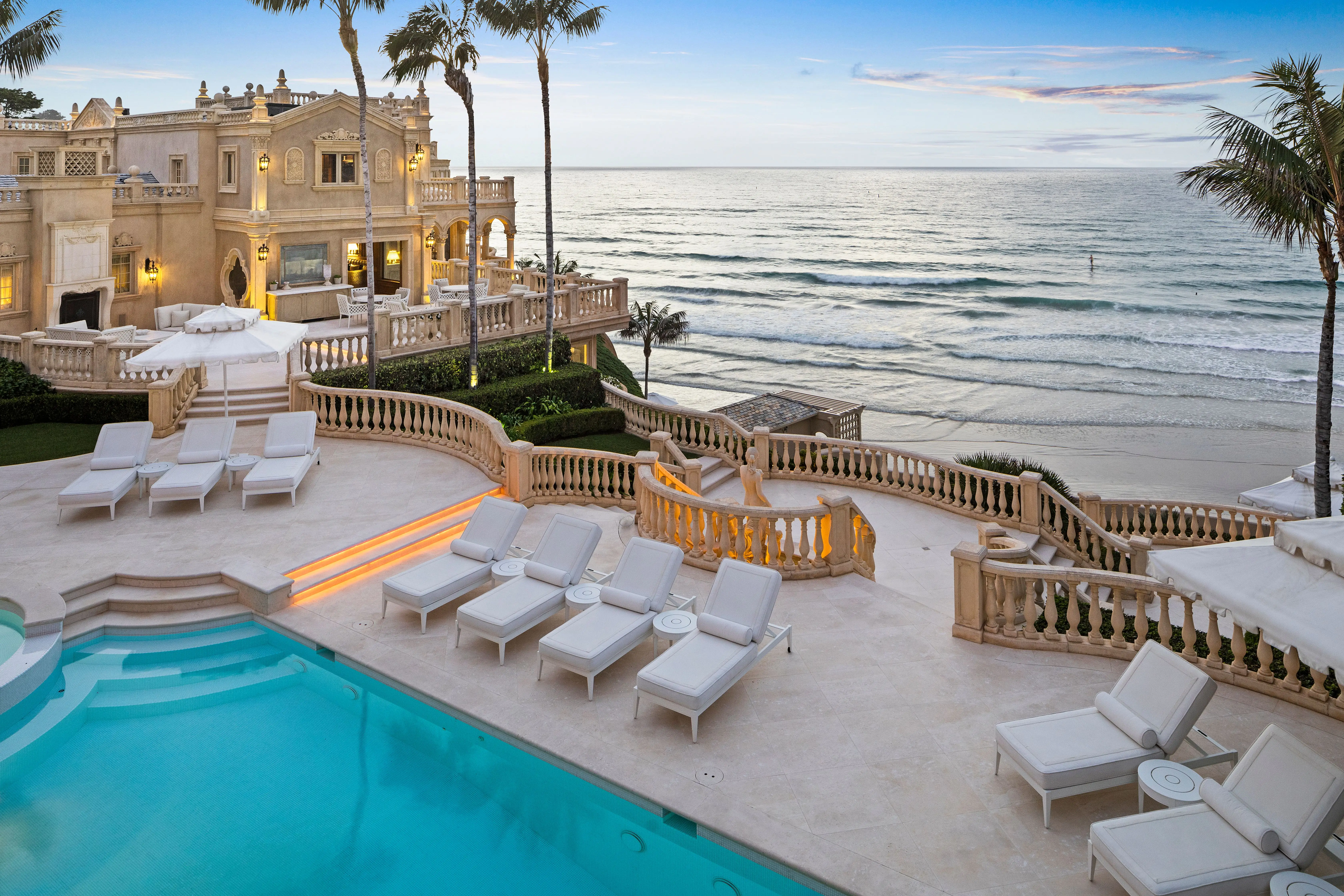 The terrace area, showing the pool and the Pacific Ocean in the background.