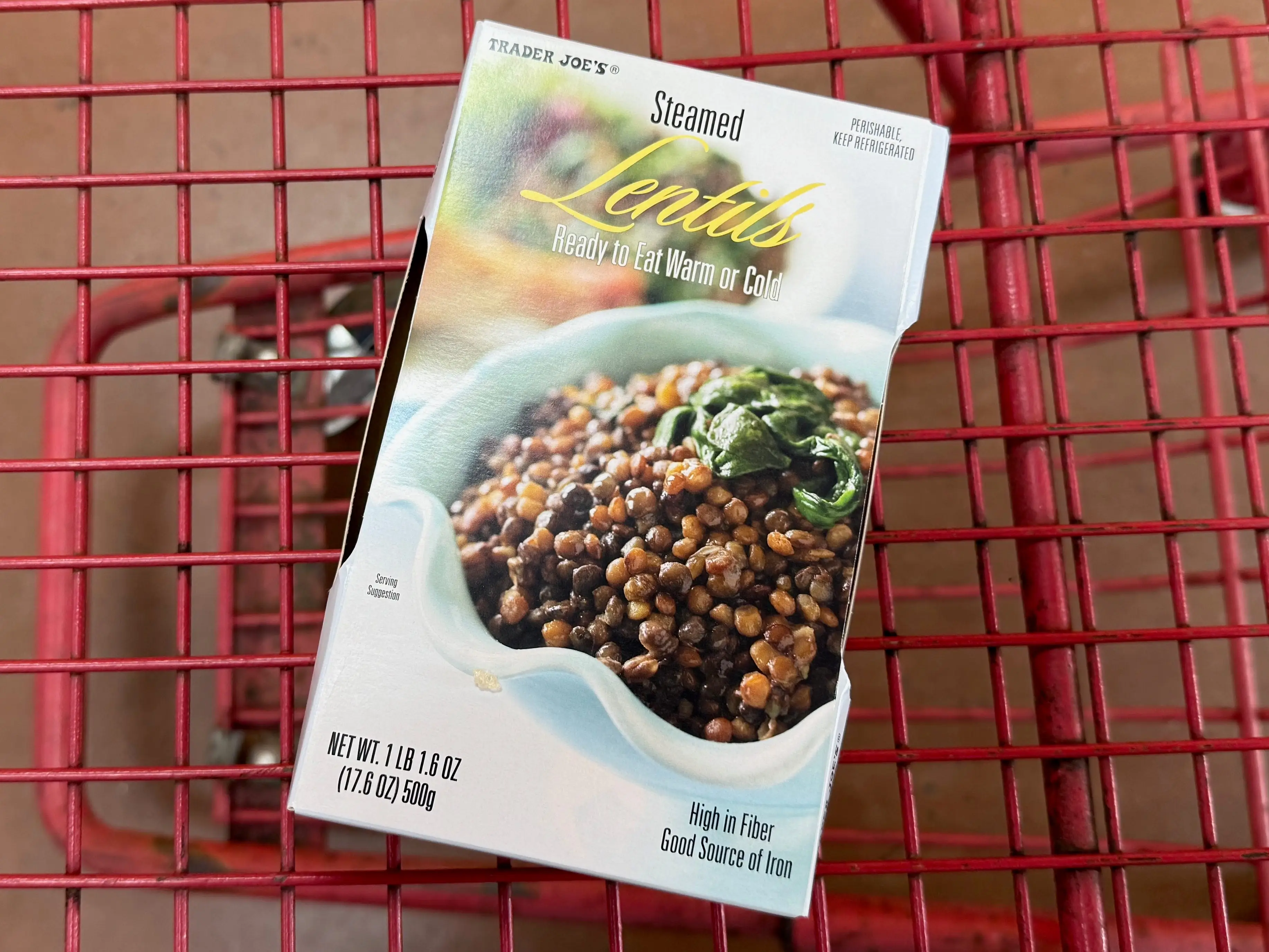 box of lentils in a cart at trader joe's
