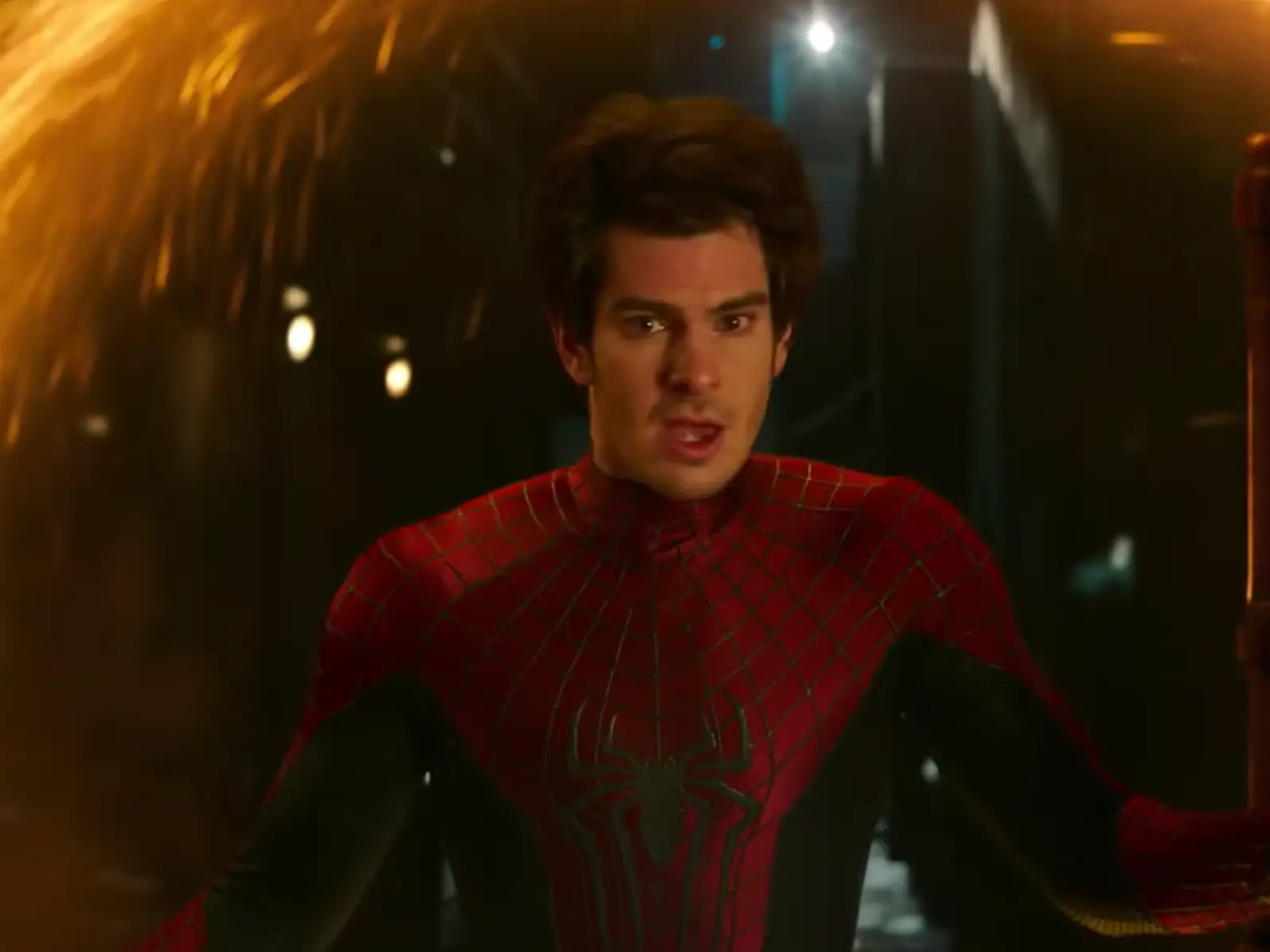 Andrew Garfield's version of Spider-Man emerging from a portal in 
