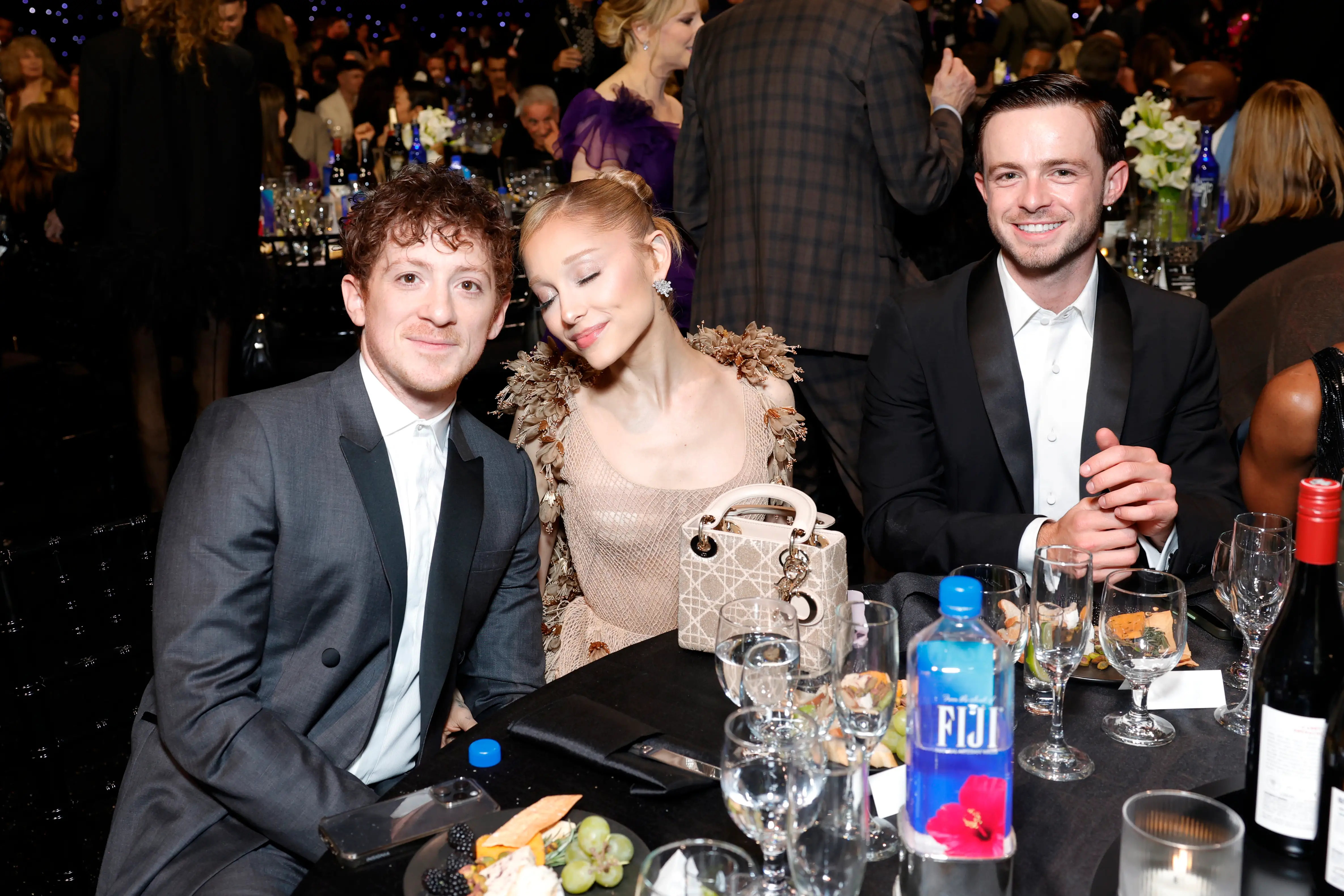 Ethan Slater, Ariana Grande, and Doug Middlebrook at the 2025 Critics Choice Awards.