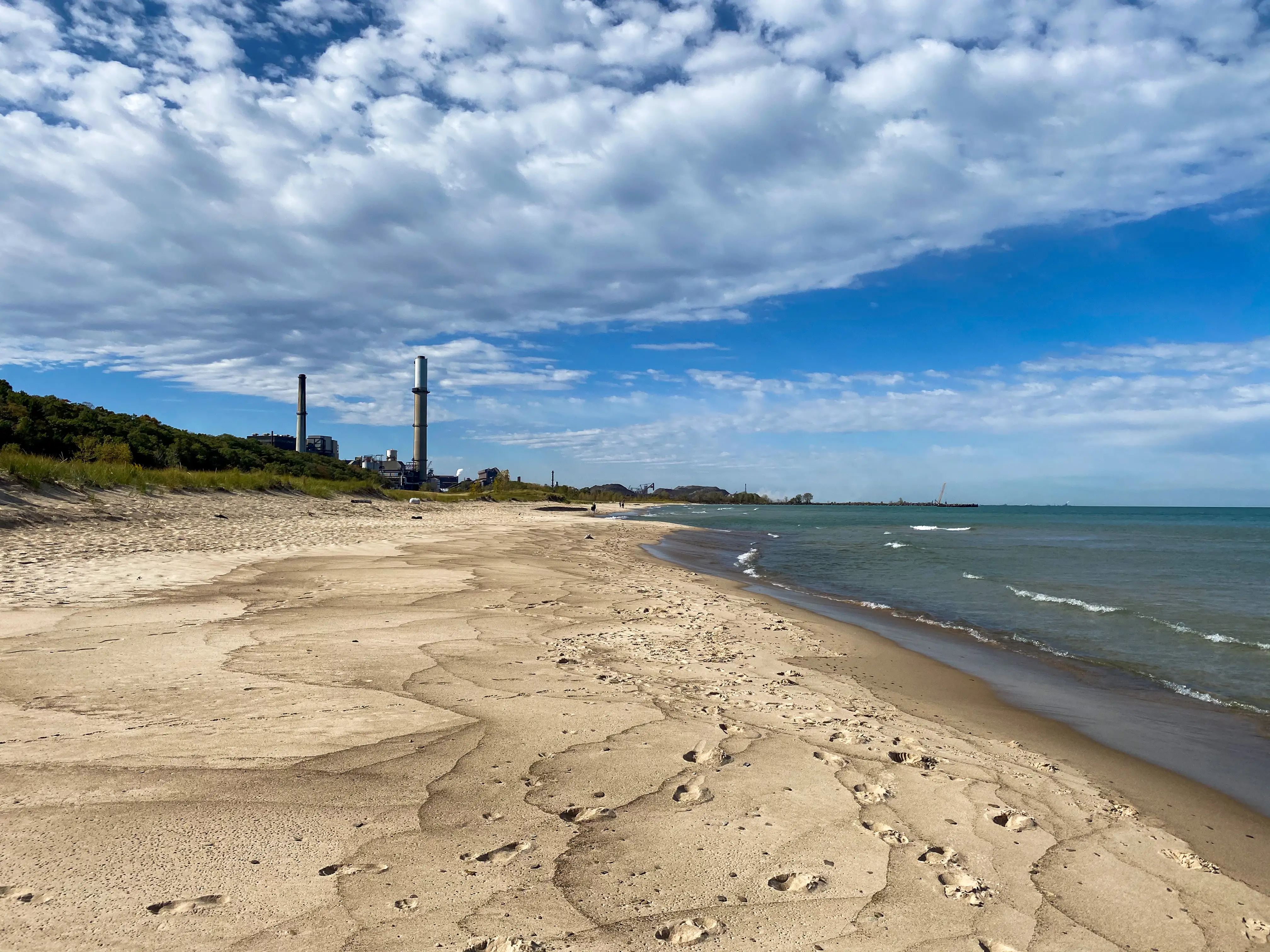 View of power plant behind sand and dunes in Indiana Dunes