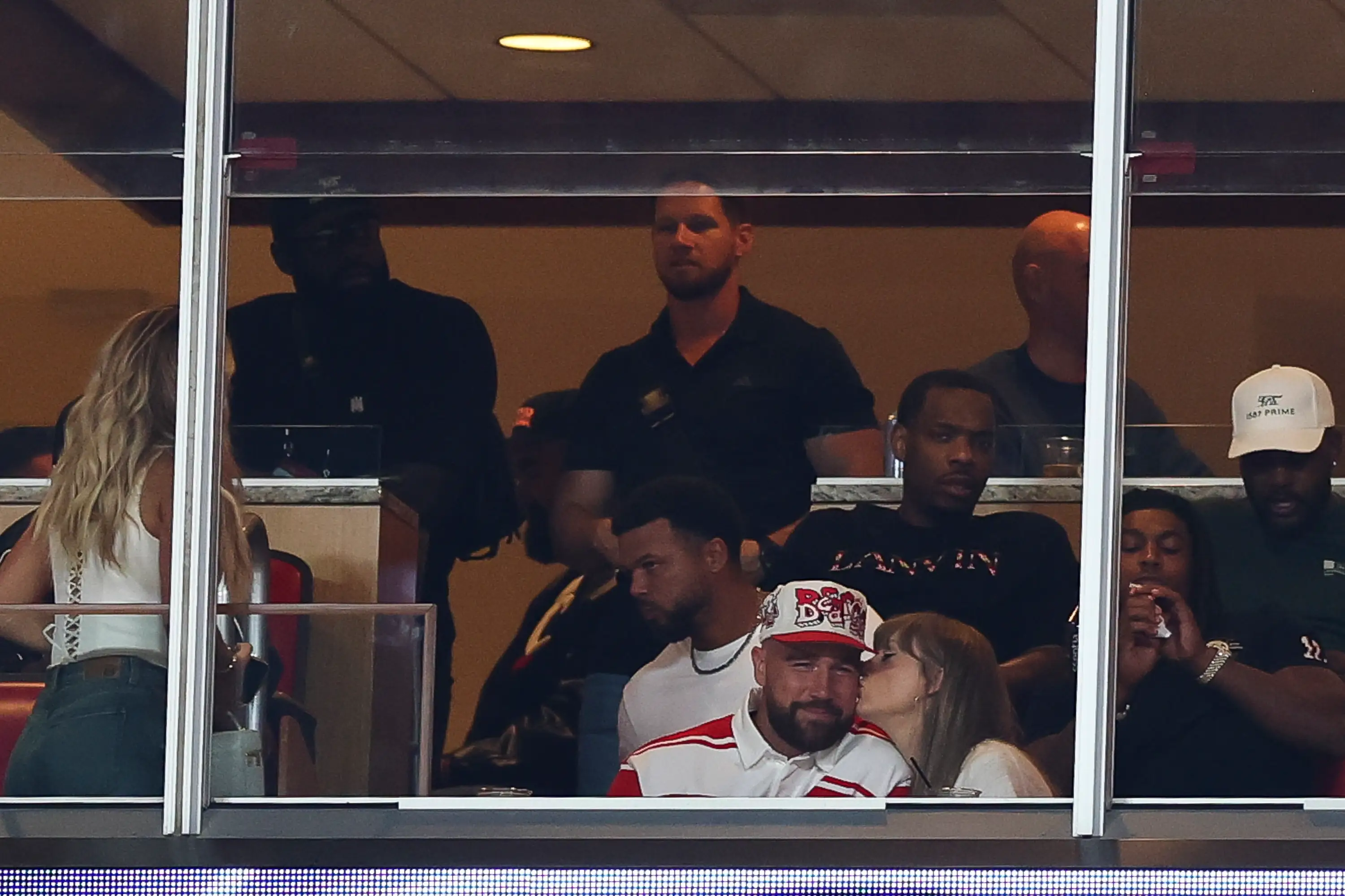 Travis Kelce and Taylor Swift watch the Nebraska Cornhuskers play the Cincinnati Bearcats at Arrowhead Stadium on August 28, 2025.