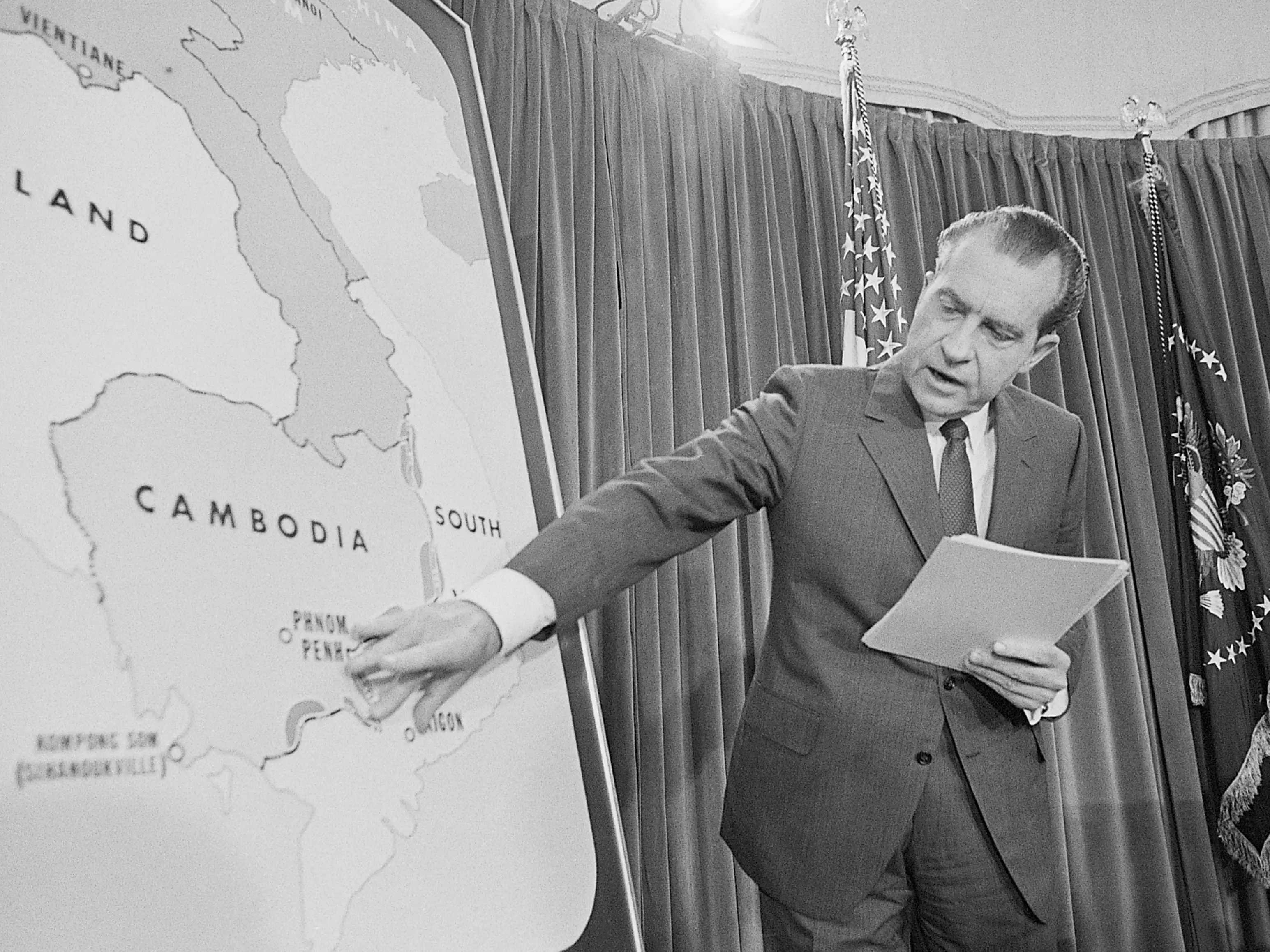 Richard Nixon points to a map of Cambodia