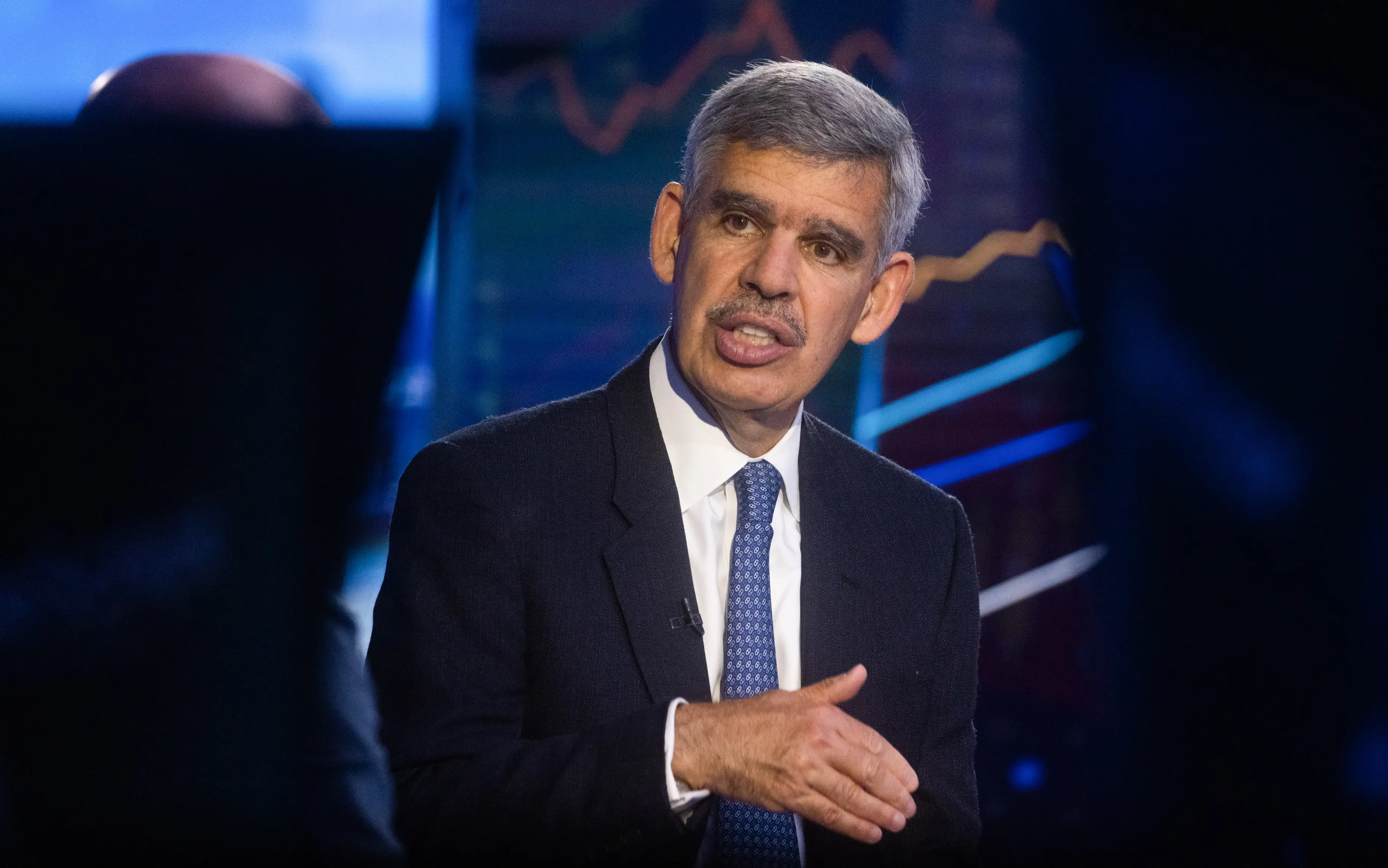 Economist Mohamed El-Erian answers questions during a TV interview.