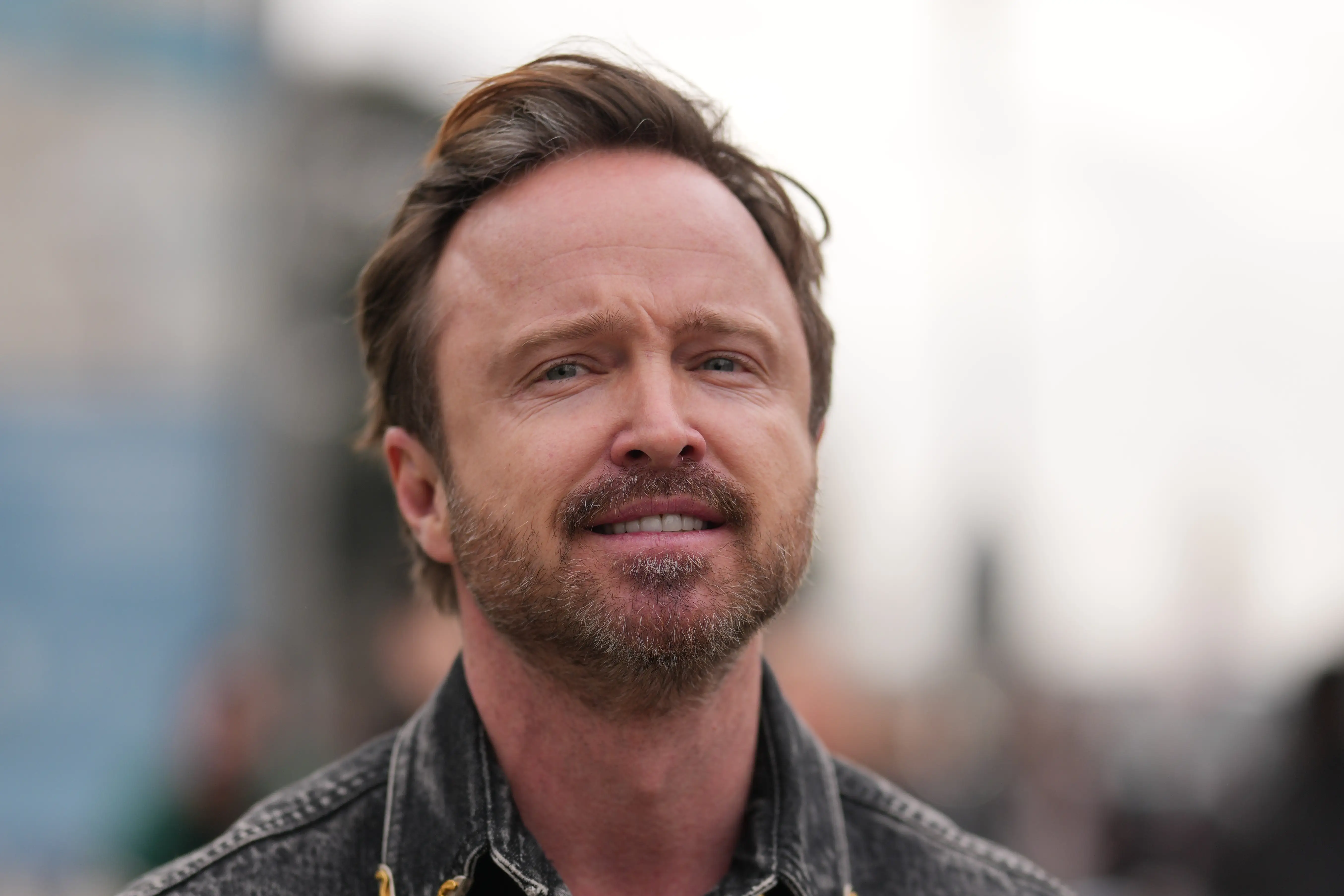 A close-up shot of Aaron Paul.
