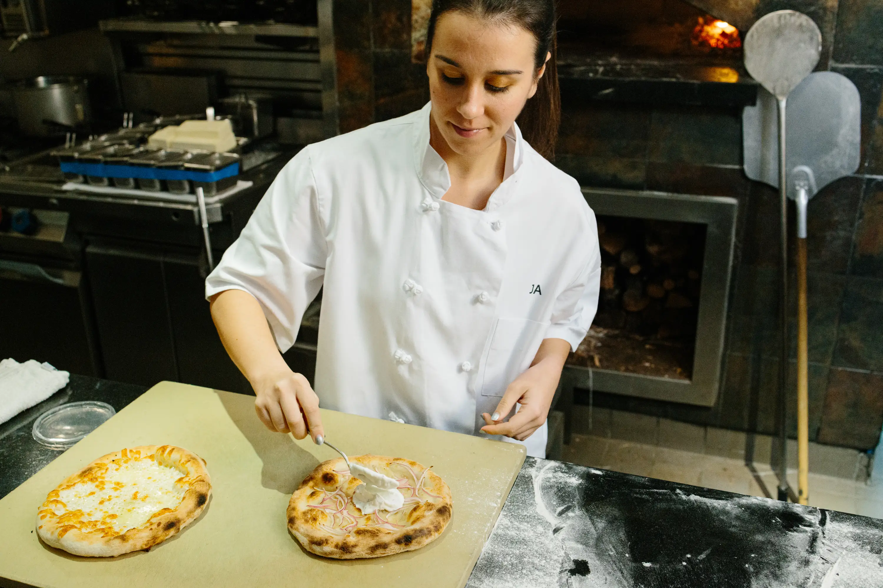 Making smoked salmon pizza