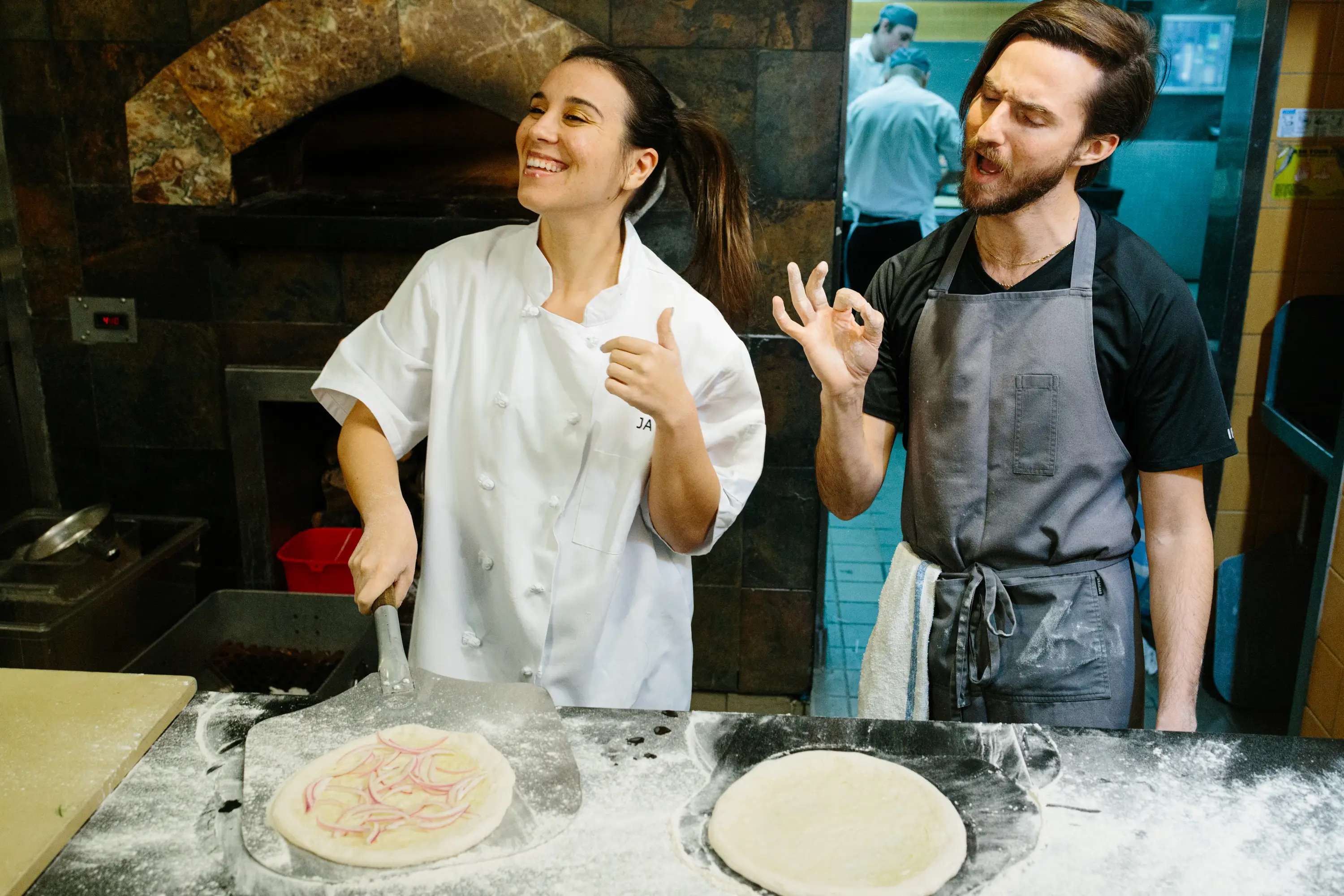 Making smoked salmon pizza