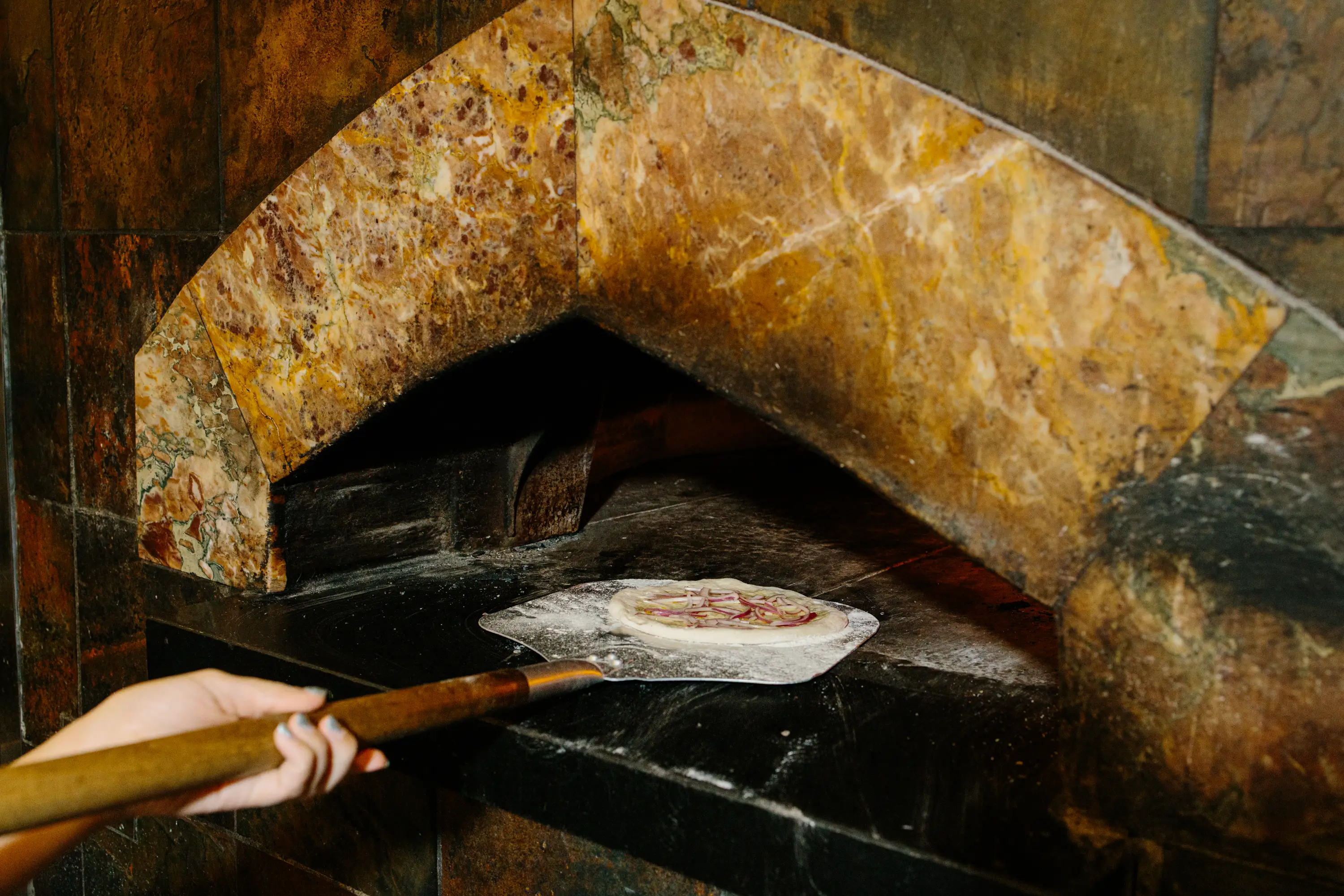 Making smoked salmon pizza
