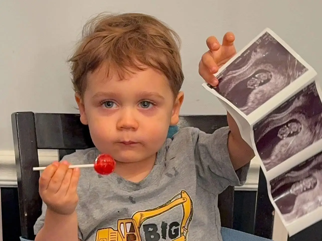 Toddler holding ultrasound