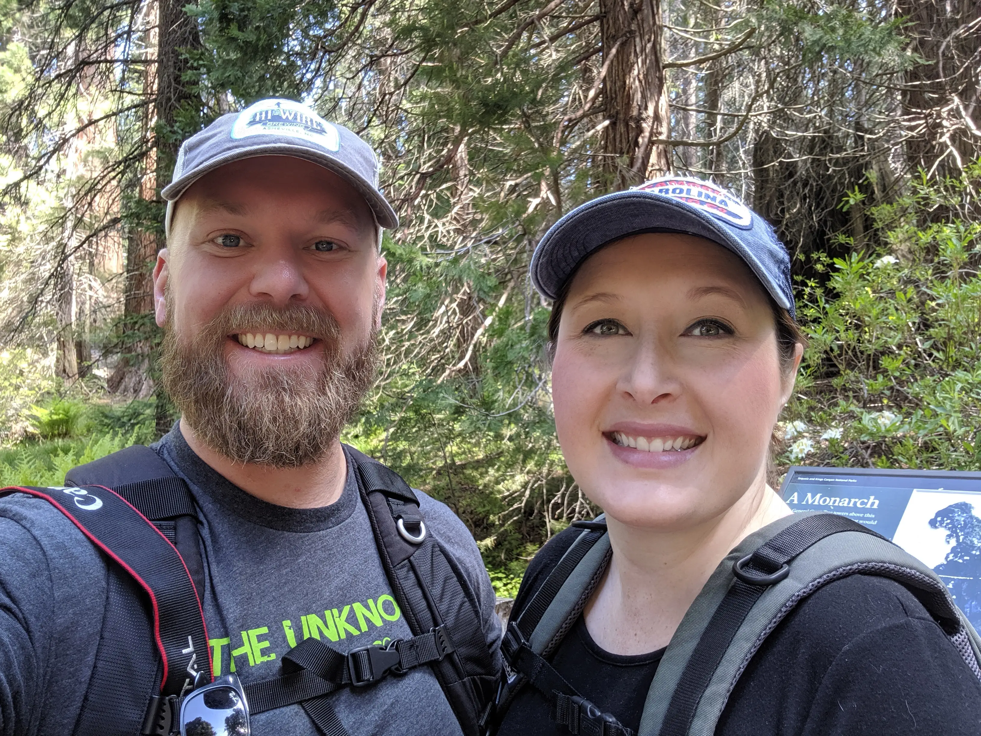 Couple smiling with hats on during hike in Kings Canyon
