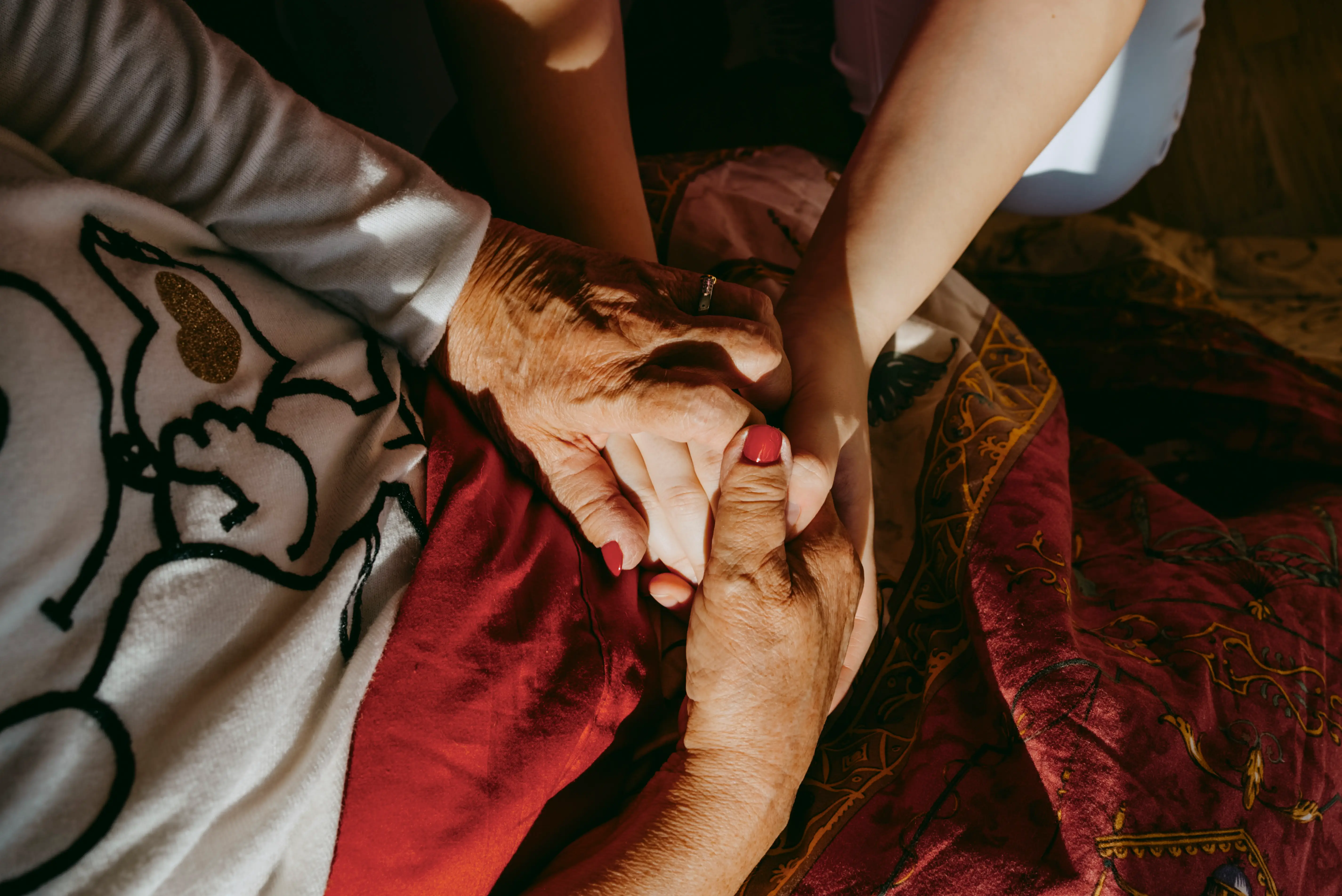 Women holding hands