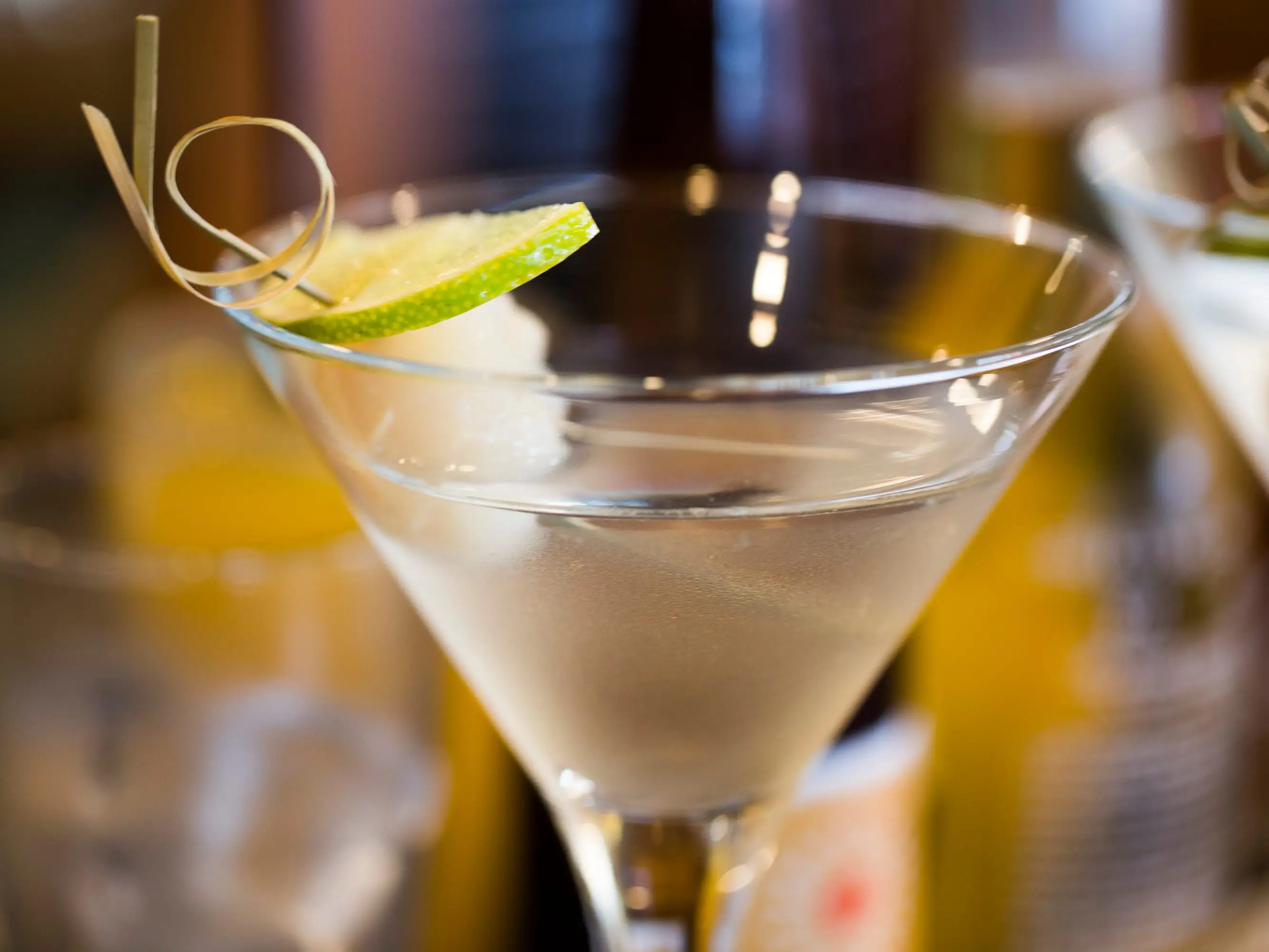 A lychee martini on a bar.
