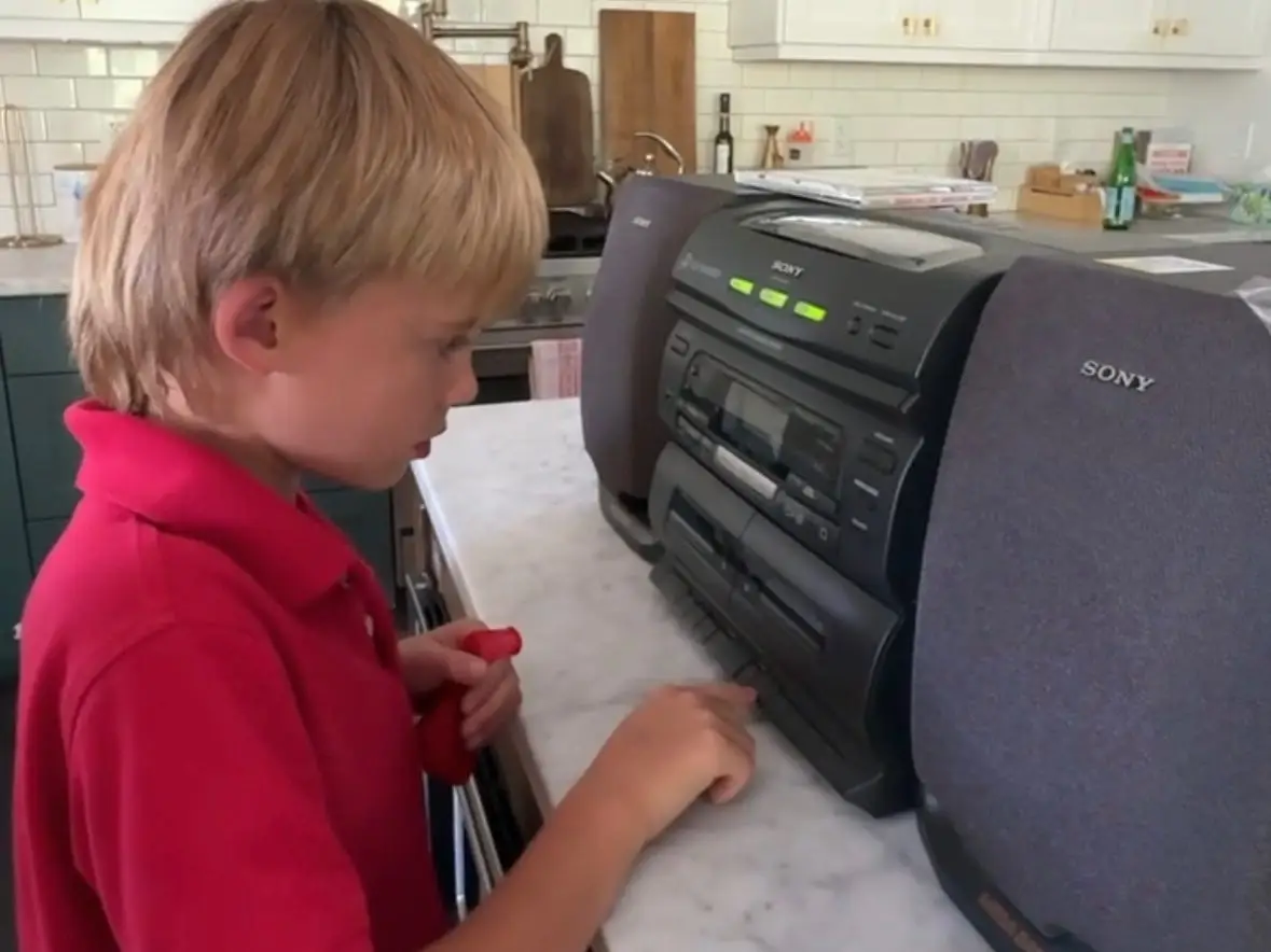 Kid recording music