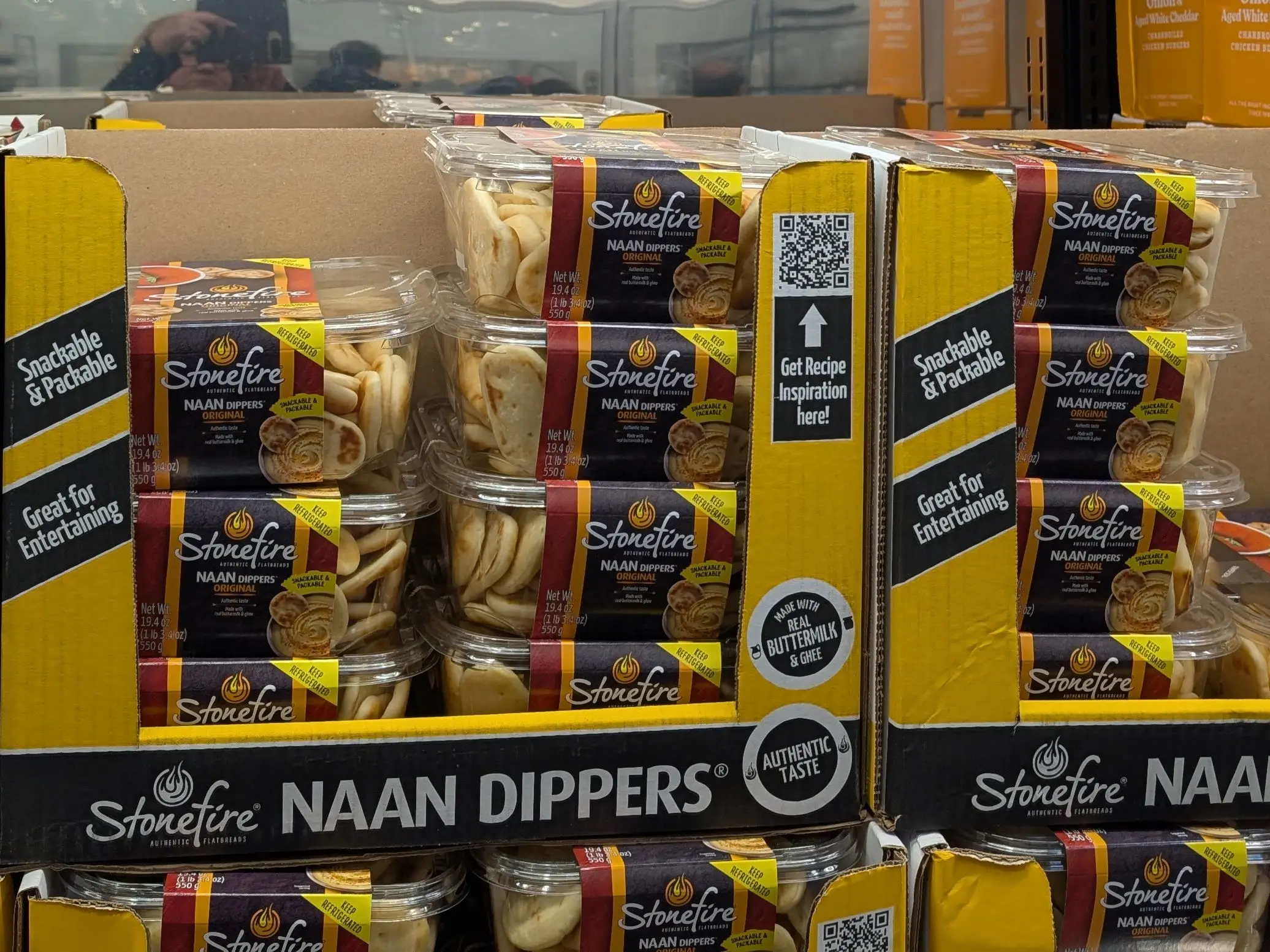 Multiple containers of Stonefire naan dippers.