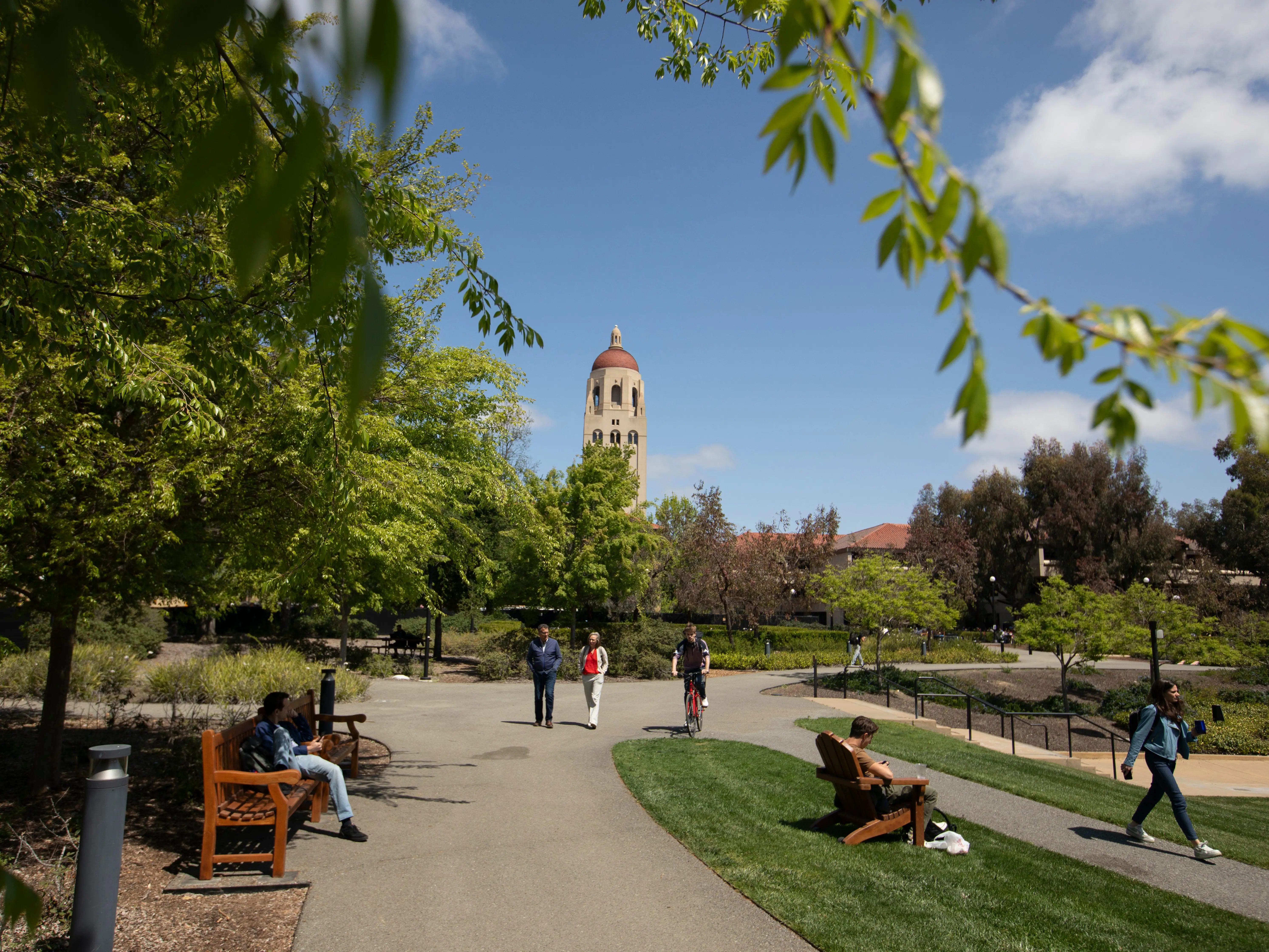 People walk on the campus of Stanford University.