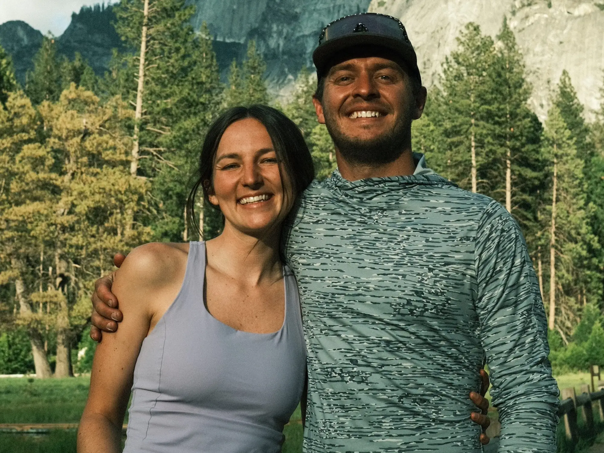 A couple smiles at Yosemite National Park in California.