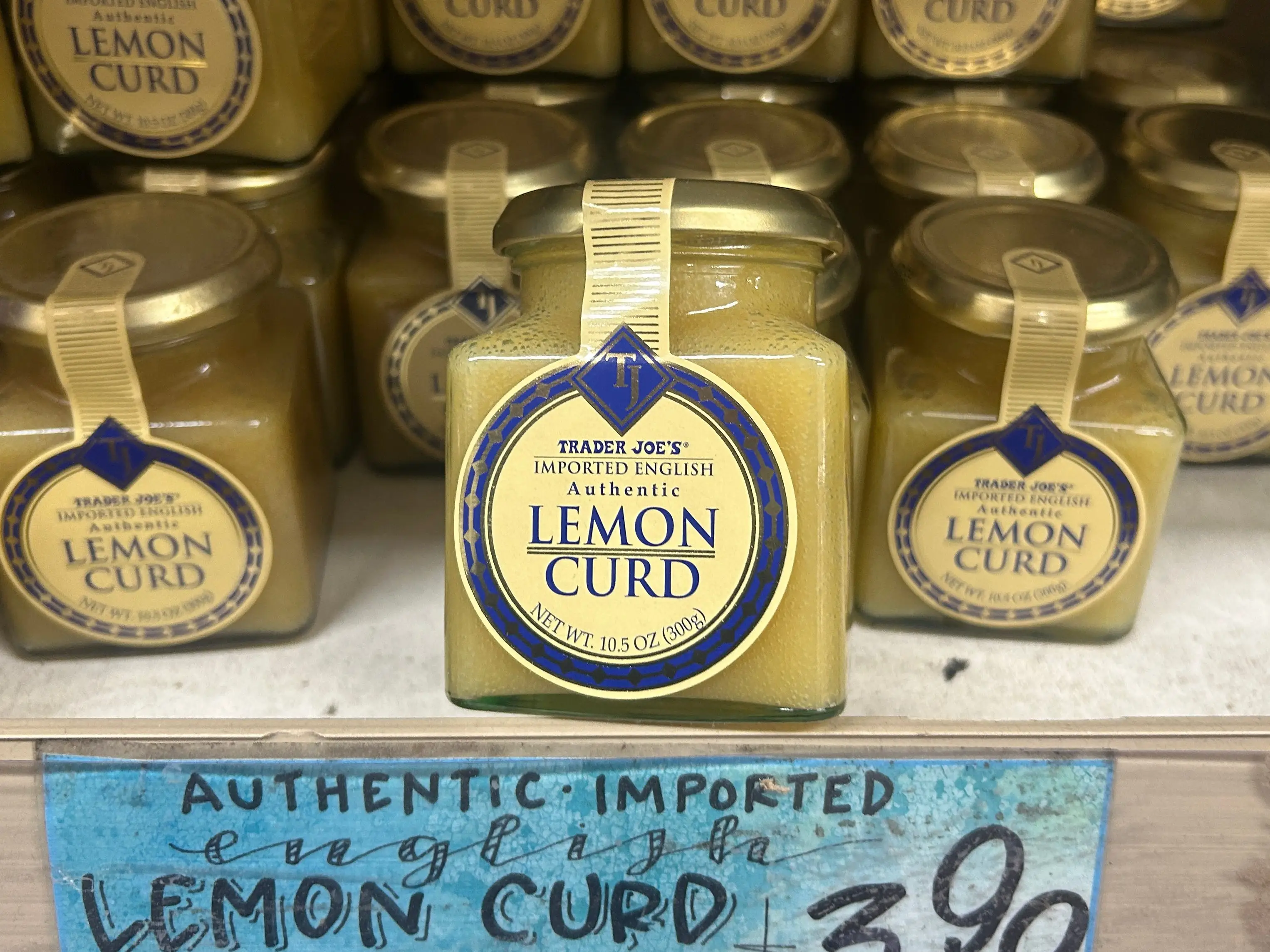 Several containers of Trader Joe's authentic imported English lemon curd.