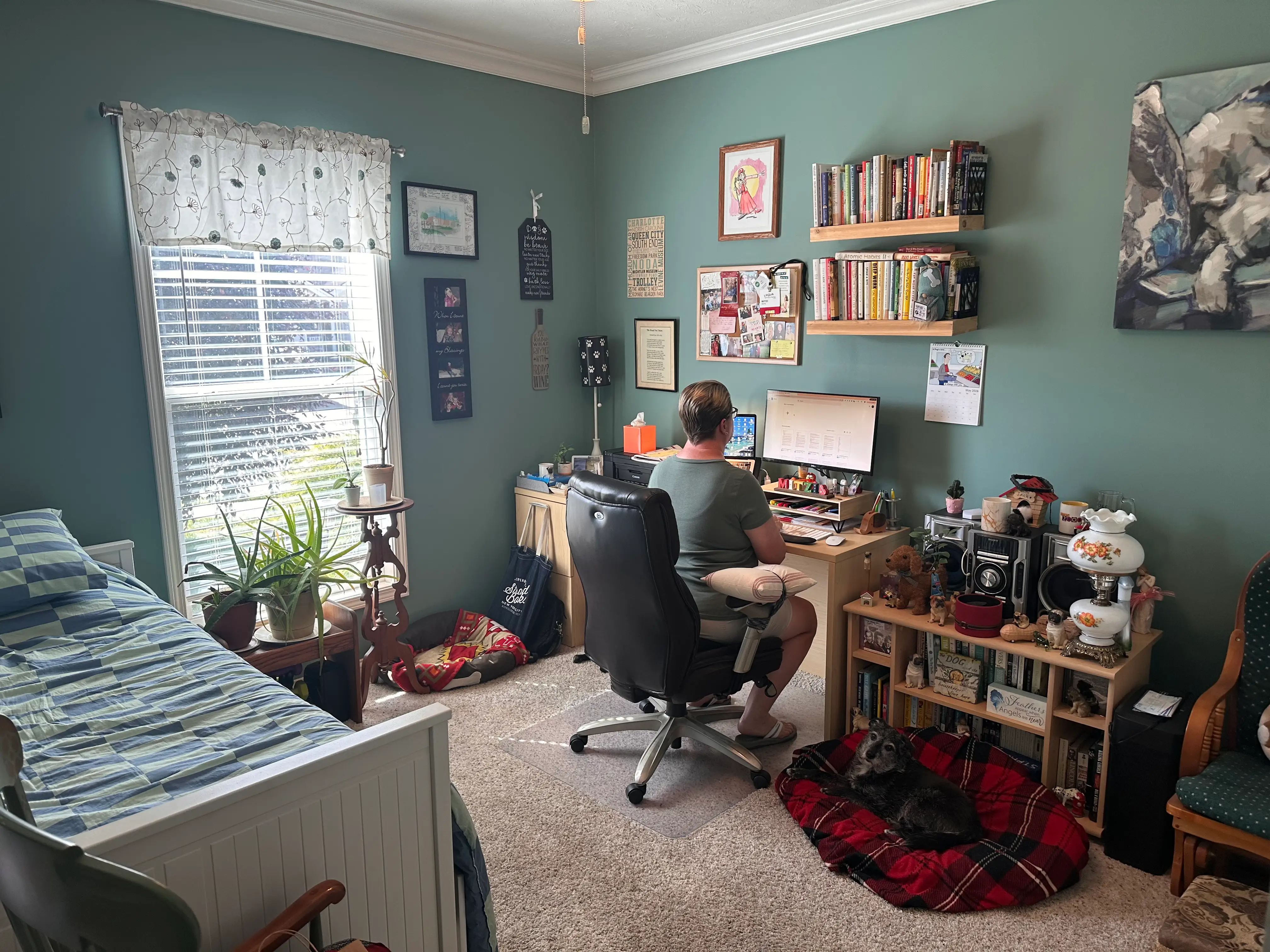 Woman sitting at desk in home office space
